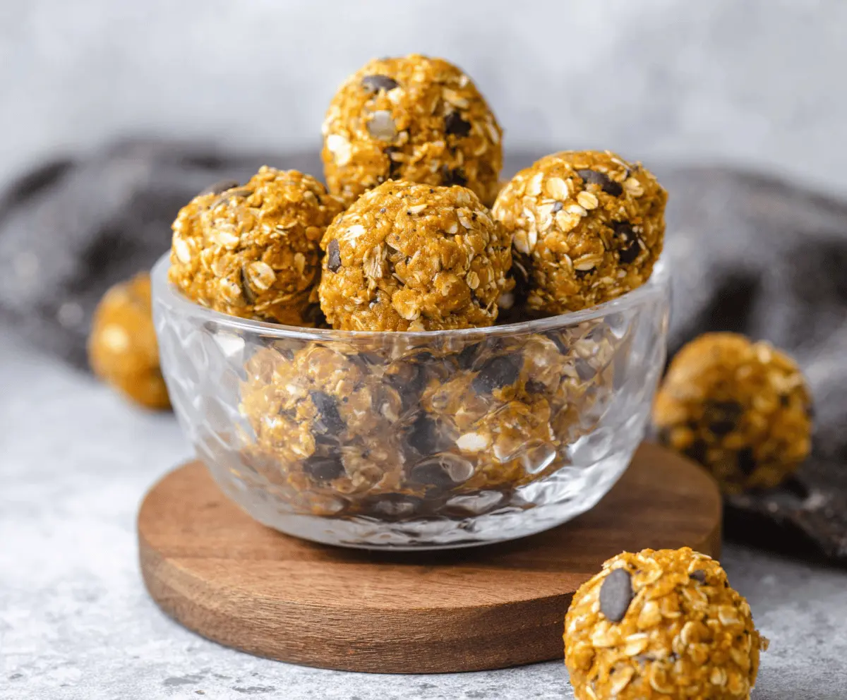 Delicious homemade pumpkin banana protein balls with a crunchy exterior and soft interior, perfect for healthy snacks.
