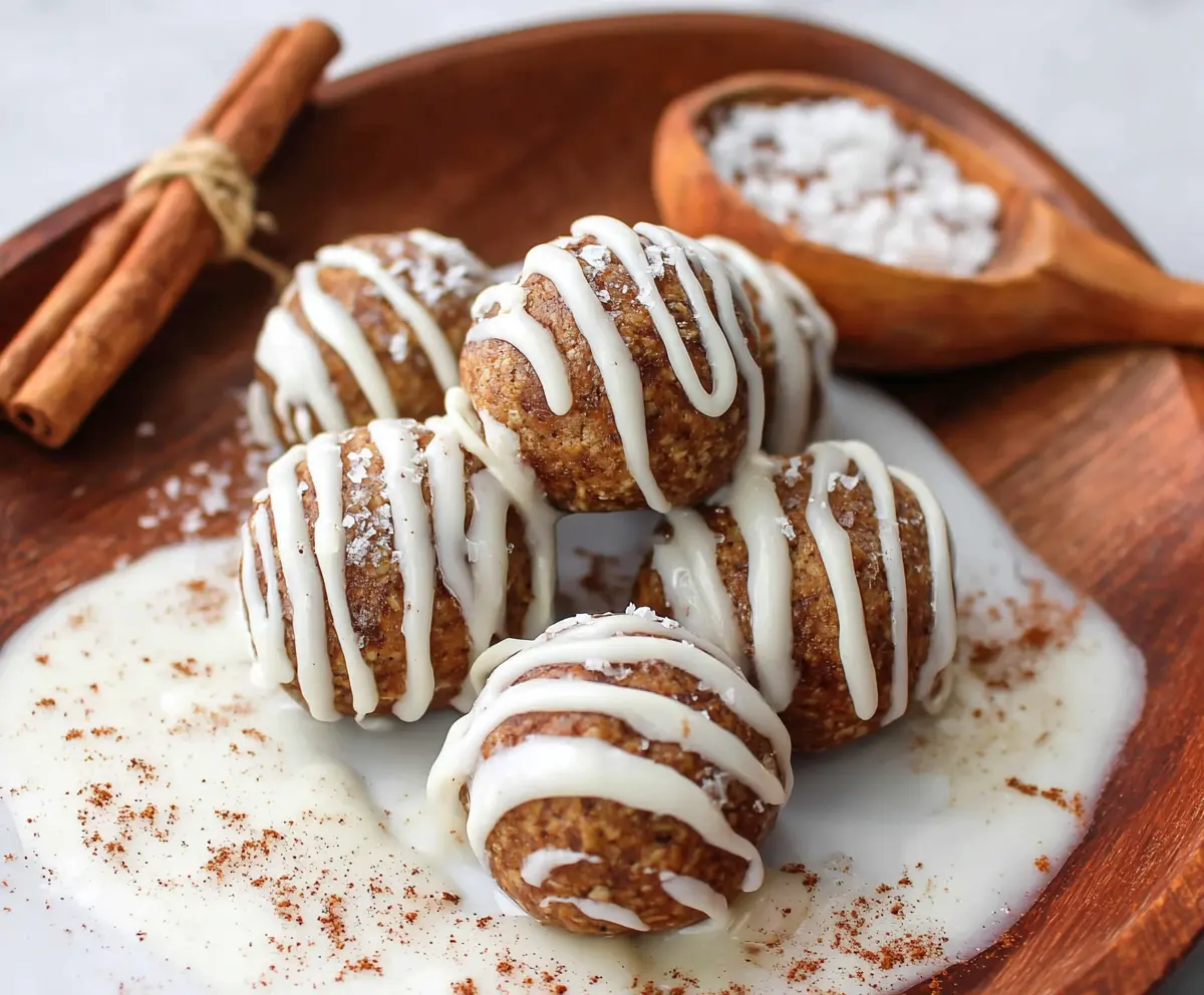 Delicious Cinnamon Roll Protein Bites on a plate, perfect for a healthy snack.