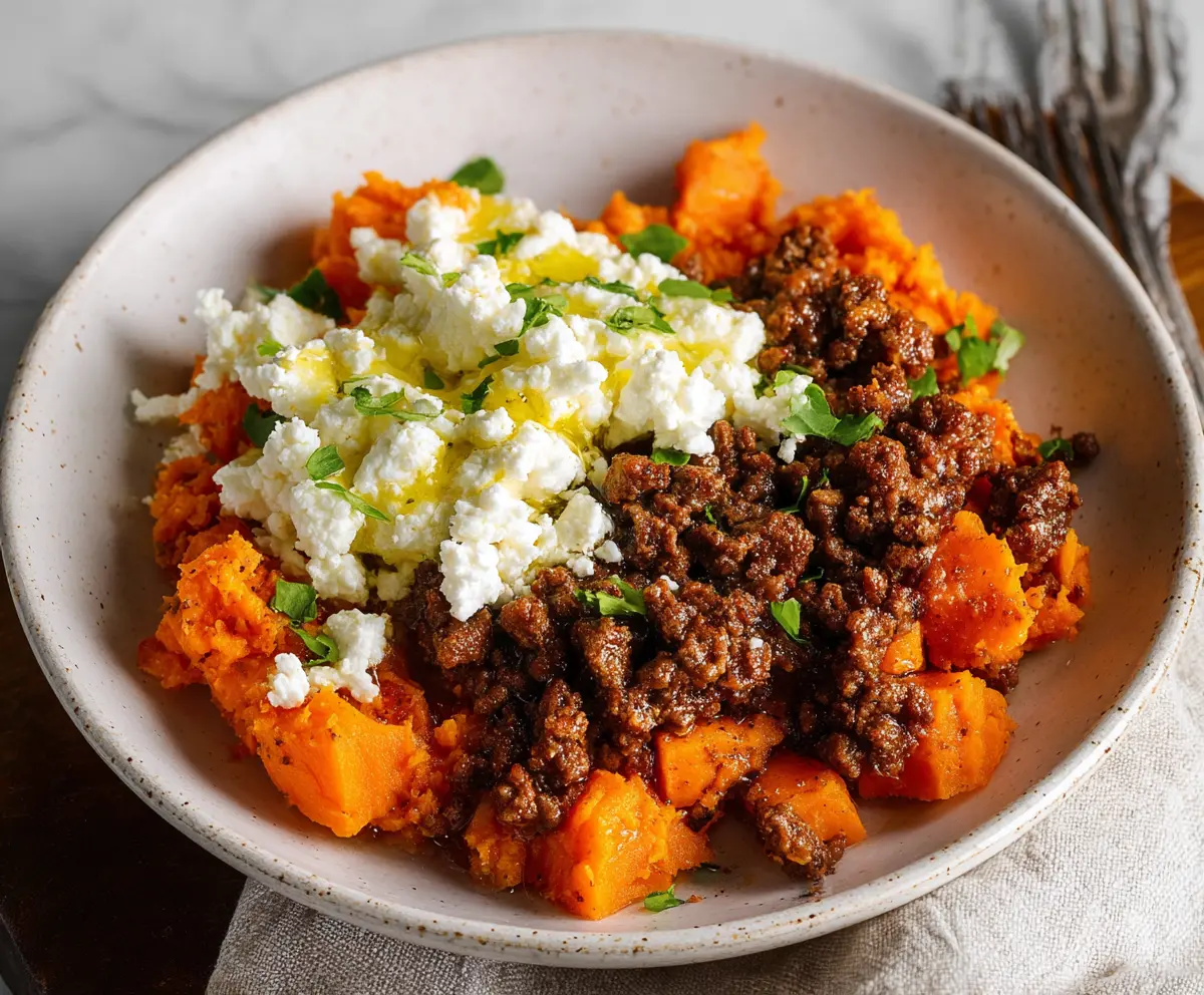Delicious Cottage Cheese with Sweet Potato and Beef dish served on a plate.