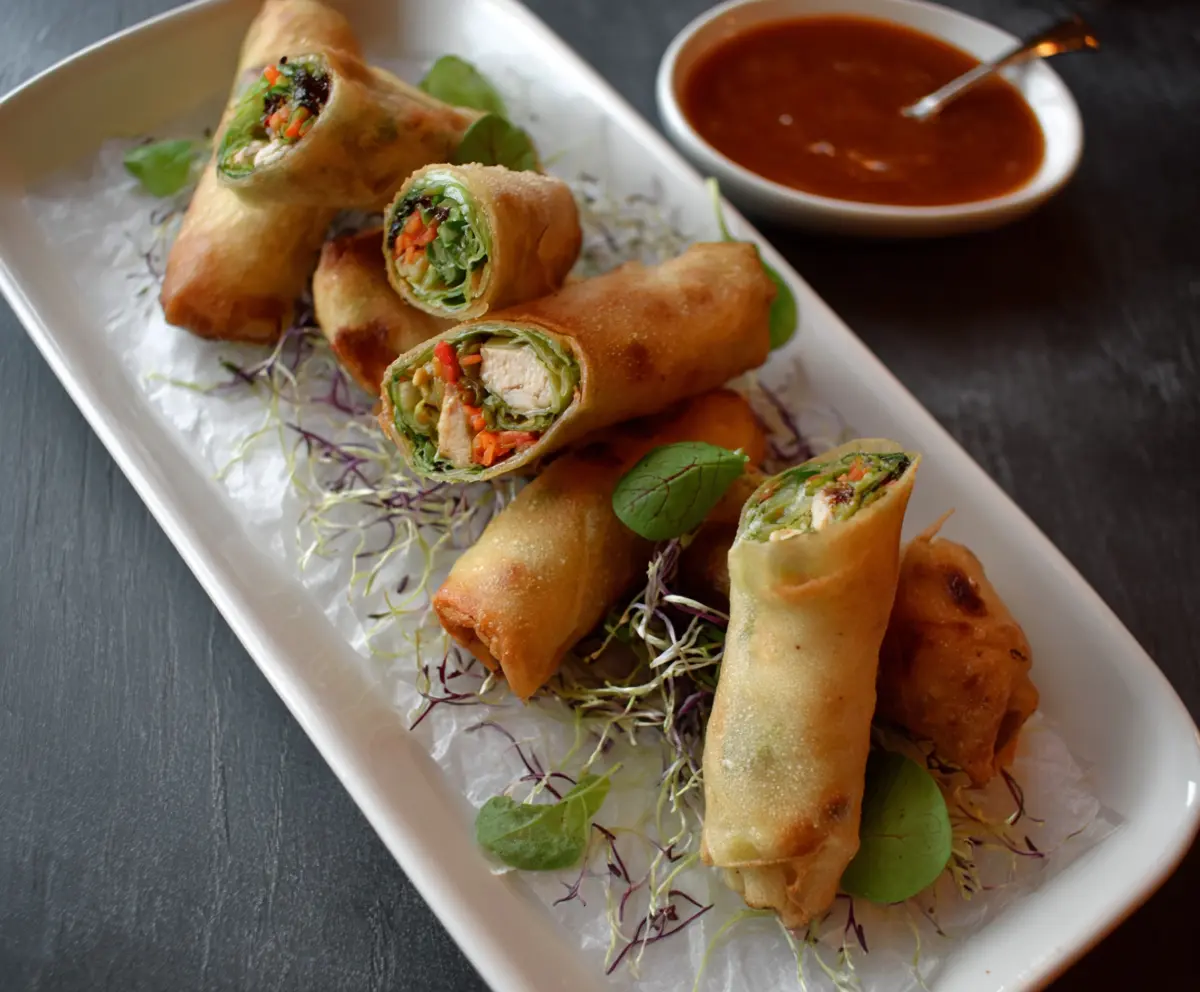 Fresh chicken vegetable spring rolls with colorful vegetables and crispy rice paper